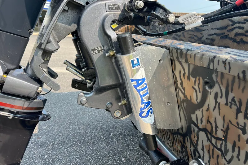 Slide: The Image of Outboard motor mount on 2025 Xpress H20B Bay boat with Atlas hydraulic jack plate. - 15