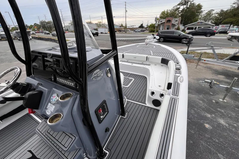 Slide: The Image of 2021 Tidewater 2300 Carolina Bay boat interior with sleek design and modern controls. - 10