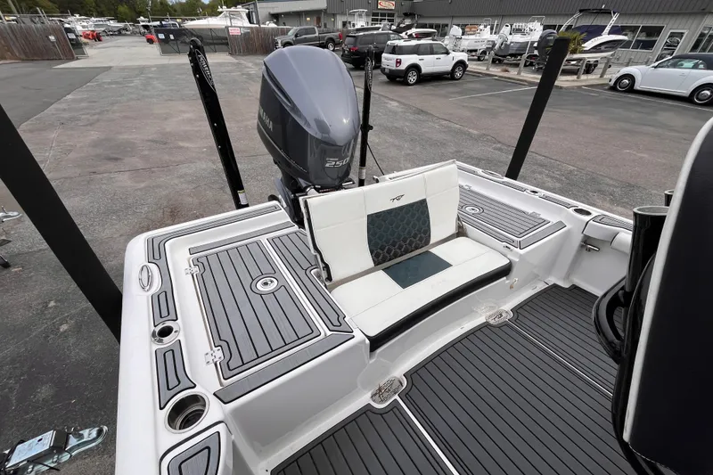 Slide: The Image of 2021 Tidewater 2300 Carolina Bay boat with Yamaha 250 engine, docked at marina. - 6