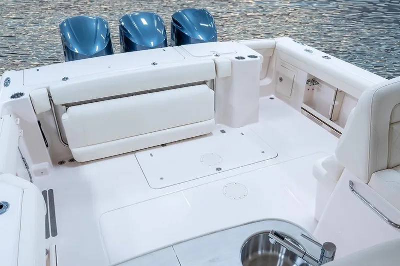 Slide: The Image of Manufacturer Provided Image: 2023 Grady-White Freedom 335 boat interior with triple outboard engines. - 12