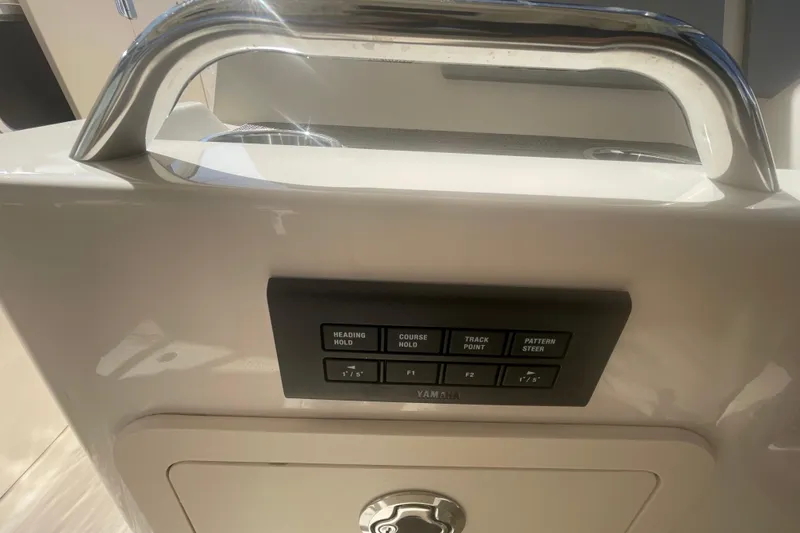 Slide: The Image of Control panel on 2023 Grady-White Freedom 335 boat with Yamaha buttons. - 38