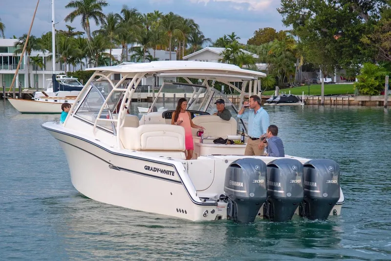 Slide: The Image of Manufacturer Provided Image: 2023 Grady-White Freedom 335 boat with Yamaha engines on a scenic waterway. - 4