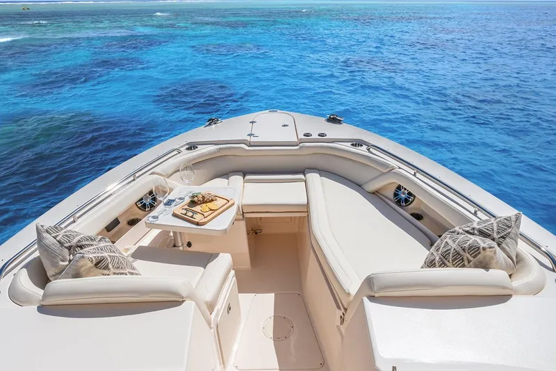 Slide: The Image of Manufacturer Provided Image: 2023 Grady-White Freedom 335 boat with luxurious seating and ocean view. - 7