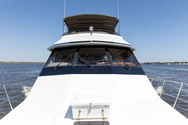 Slide: The Image of 1997 Navigator 5600 Sundance Pilothouse yacht on open water. - 44
