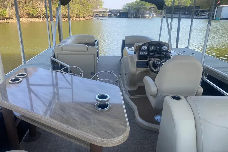Slide: The Image of 2017 Sylvan Mirage Cruise 8524 LZ PB pontoon boat interior with helm and seating. - 3