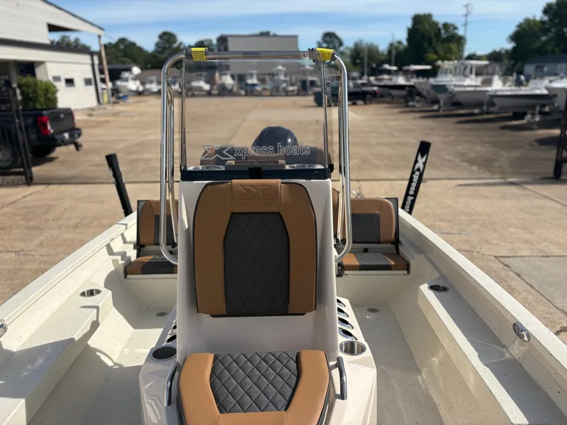 Slide: The Image of 2026 Xpress H20B Hyper-Lift Bay boat, interior view, modern seating. - 9