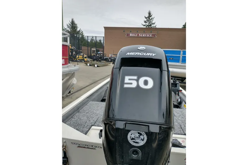 Slide: The Image of 2026 Tracker Pro 170 boat with Mercury 50 engine at service center. - 4