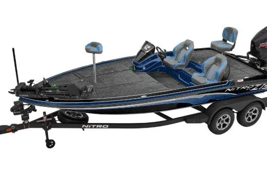 The Image of 2026 Nitro Z19 XL fishing boat with dual seats and trailer, side view. - 0