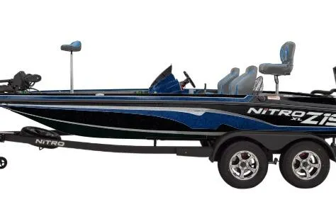 Slide: The Image of 2026 Nitro Z19 XL boat with sleek design and dual-axle trailer. - 1