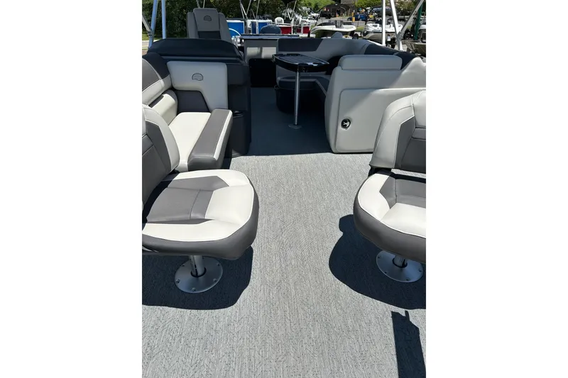 Slide: The Image of 2026 Sun Tracker Fishin' Barge 20 DLX interior with comfortable seating and modern design. - 6