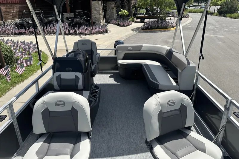 Slide: The Image of 2026 Sun Tracker Bass Buggy 16 XL Select pontoon boat with spacious seating and modern design. - 7
