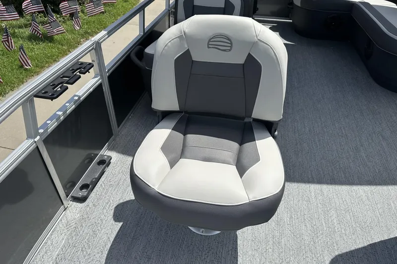 Slide: The Image of 2026 Sun Tracker Bass Buggy 16 XL Select boat seat, gray and white upholstery. - 9
