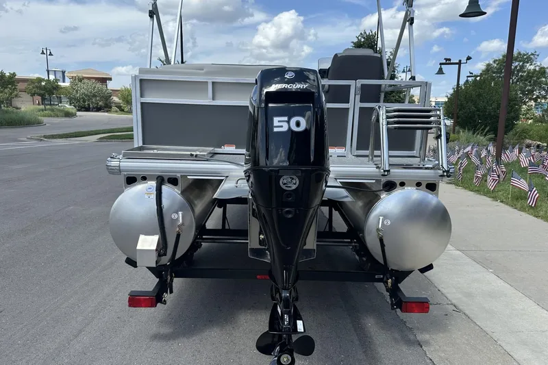 Slide: The Image of 2026 Sun Tracker Bass Buggy 16 XL Select pontoon boat with Mercury 50 outboard motor. - 3