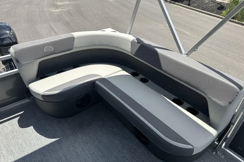 Slide: The Image of 2026 Sun Tracker Bass Buggy 16 XL Select boat seating with cup holders. - 15
