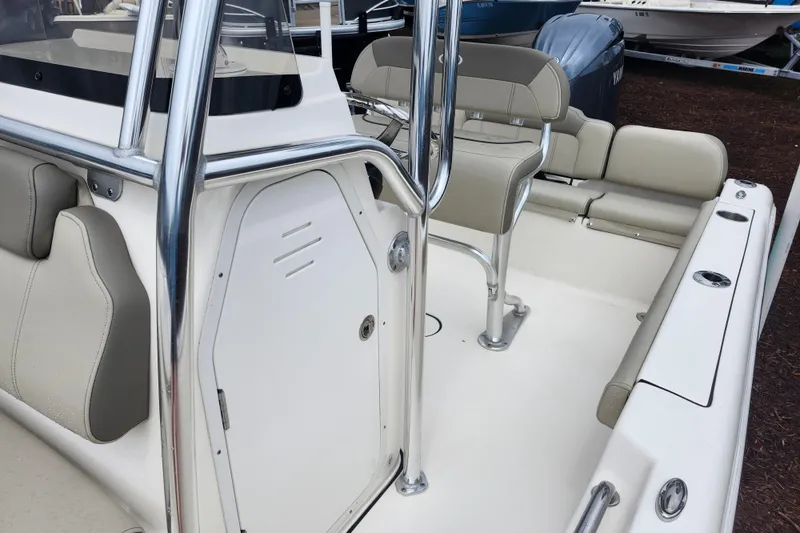 Slide: The Image of 2024 Key West 189 FS boat interior with seating and stainless steel features. - 17
