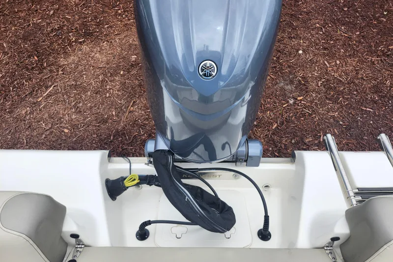 Slide: The Image of 2024 Key West 189 FS boat with Yamaha outboard motor, viewed from above. - 27
