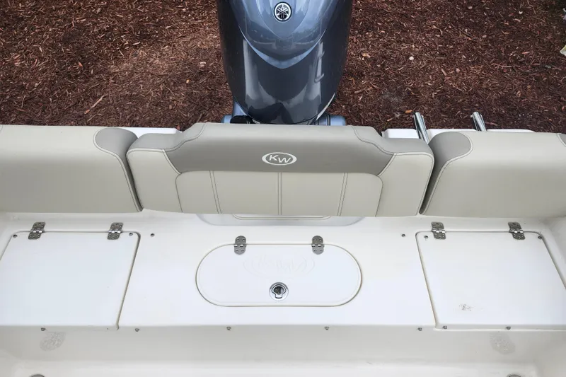 Slide: The Image of 2024 Key West 189 FS boat interior with seating and storage compartments. - 32