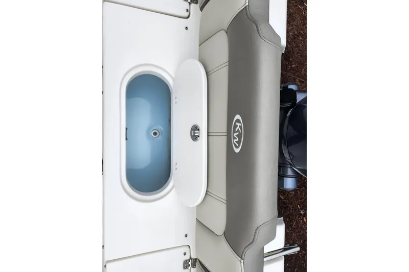 Slide: The Image of 2024 Key West 189 FS boat interior with livewell and cushioned seating. - 34