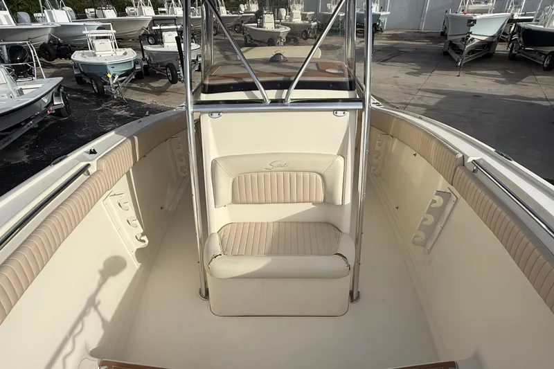 Slide: The Image of 2006 Scout 260 Sportfish boat interior with seating and rod holders. - 25
