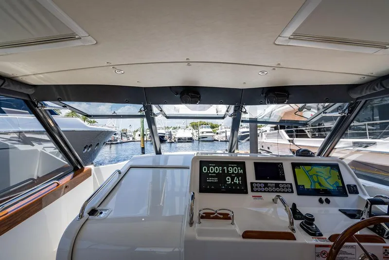 Slide: The Image of Interior view of 2024 MJM 4 boat cockpit with modern navigation. - 11