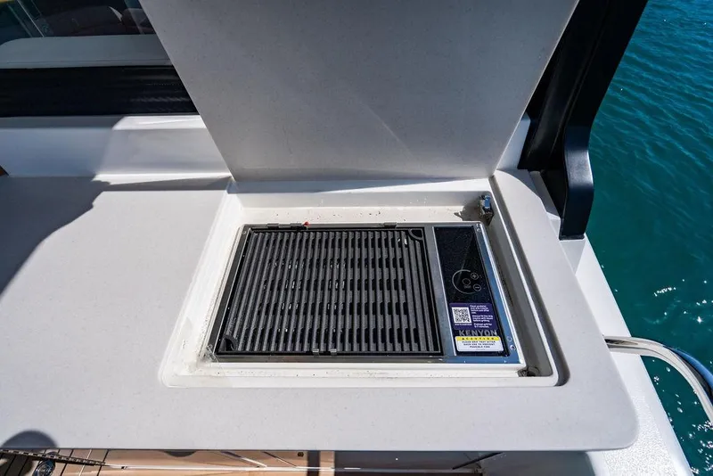 Slide: The Image of Grill on 2024 MJM 4 boat, integrated into the countertop. - 34