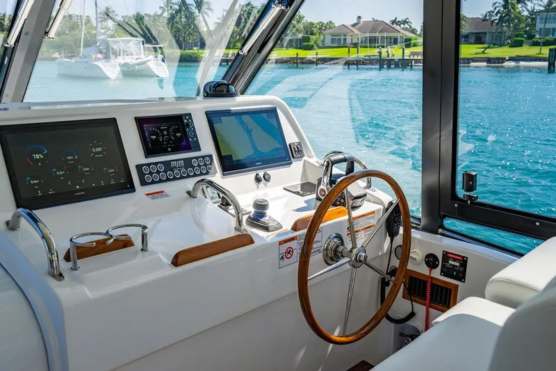 Slide: The Image of Interior view of 2024 MJM 4 boat cockpit with modern controls. - 36