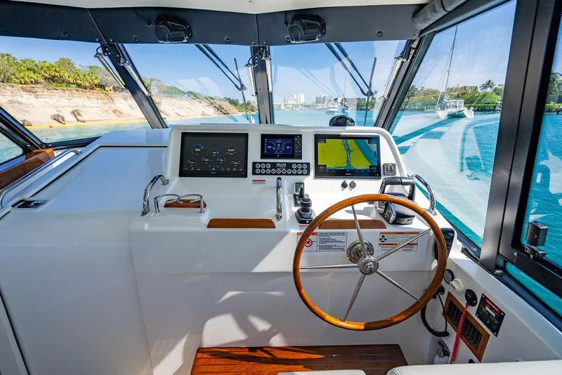 Slide: The Image of Interior view of 2024 MJM 4 boat cockpit with modern navigation. - 38