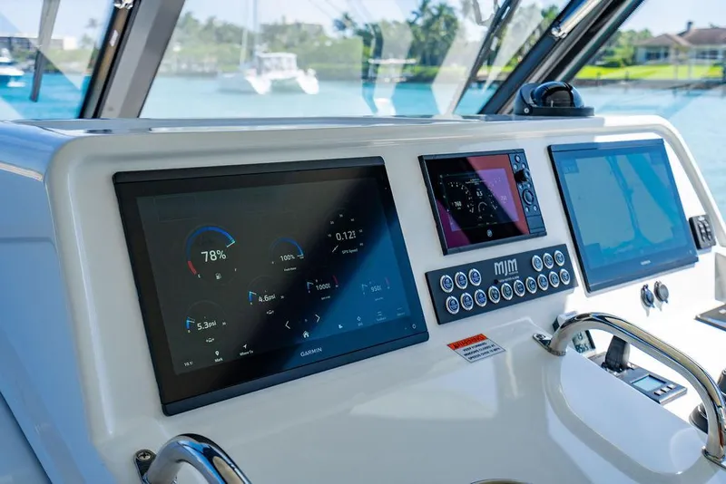 Slide: The Image of 2024 MJM 4 yacht cockpit with modern navigation systems. - 39