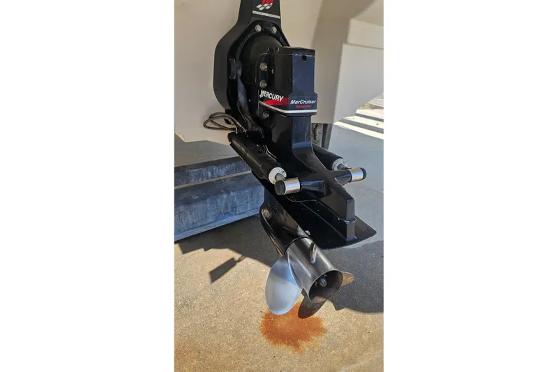 Slide: The Image of MerCruiser Alpha One outdrive on 2003 Sea Ray 220 Sundeck boat. - 23