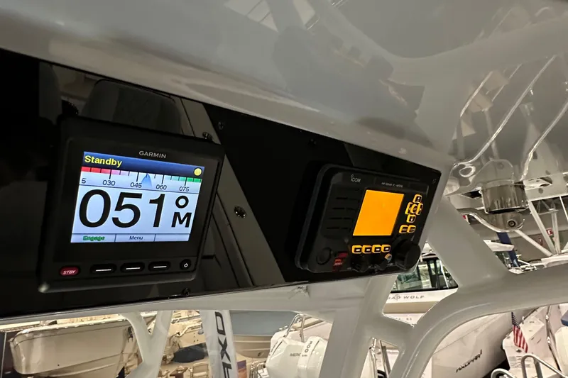 Slide: The Image of 2022 Valhalla V-33 Center Console with Garmin navigation display. - 14