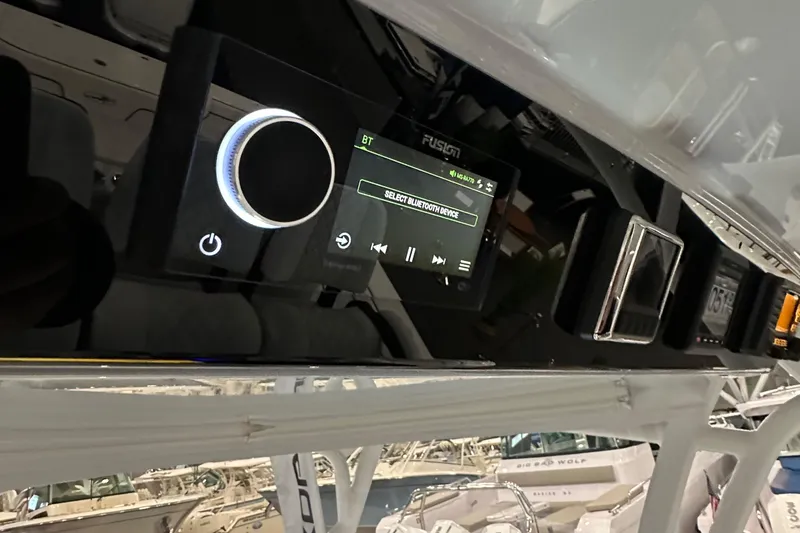 Slide: The Image of 2022 Valhalla V-33 Center Console dashboard with Fusion audio system. - 15