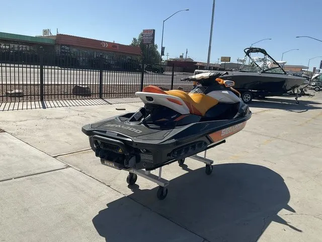 Slide: The Image of 2018 Sea-Doo GTI jet ski parked on a sunny day. - 3