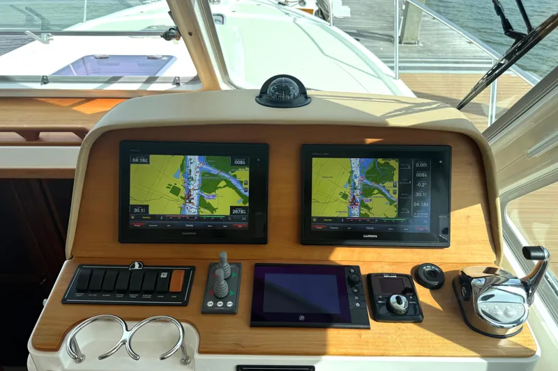 Slide: The Image of Helm of 2018 Back Cove 41 boat with dual Garmin navigation screens. - 11