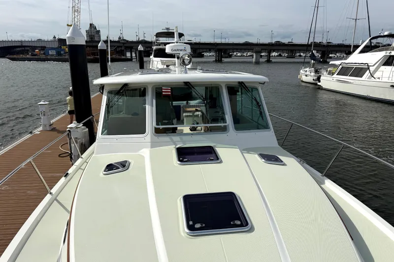 Slide: The Image of 2018 Back Cove 41 yacht docked at marina, featuring sleek design and modern equipment. - 24