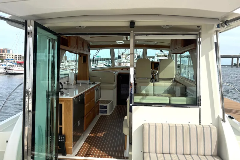 Slide: The Image of Interior view of 2018 Back Cove 41 yacht with modern kitchen and seating area. - 4