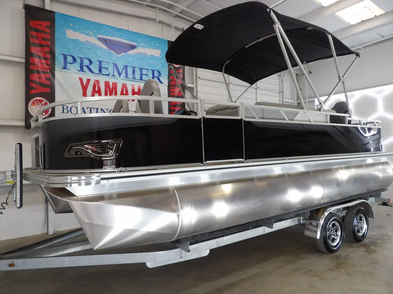 Slide: The Image of 2026 Avalon Venture 85 pontoon boat in showroom. - 14