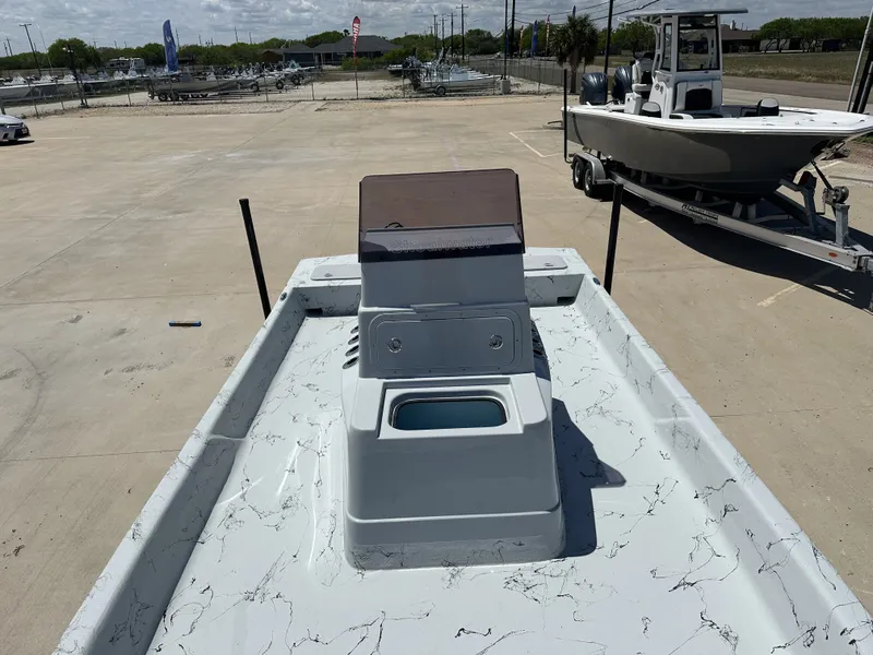 Slide: The Image of 2026 Shoalwater 20' Catamaran on a parking lot. - 12