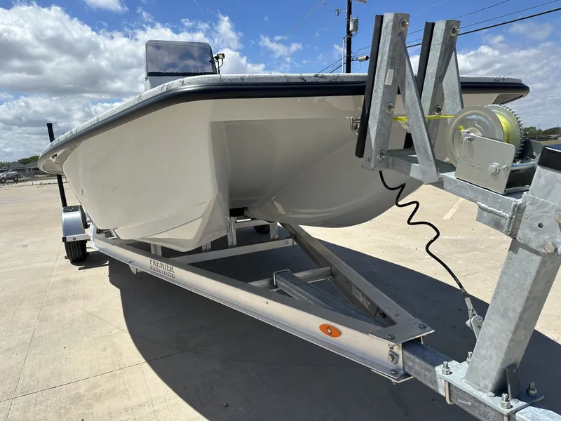 Slide: The Image of 2026 Shoalwater 20' Catamaran on trailer under sunny skies. - 6