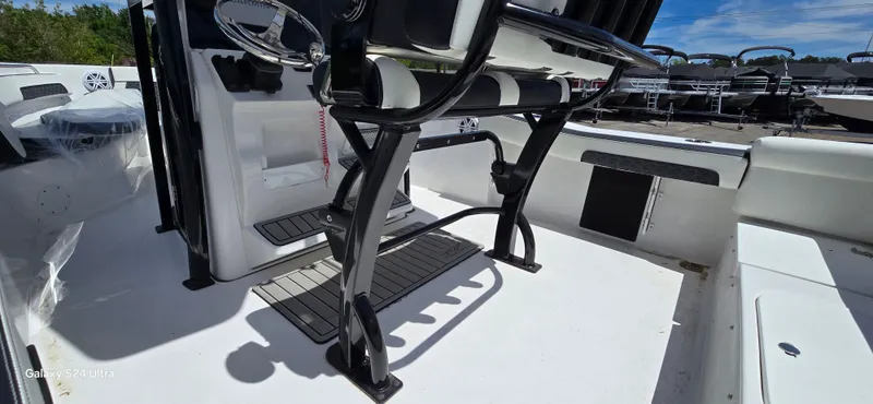 Slide: The Image of Interior view of 2026 Tidewater 220 LXF boat with modern seating. - 9