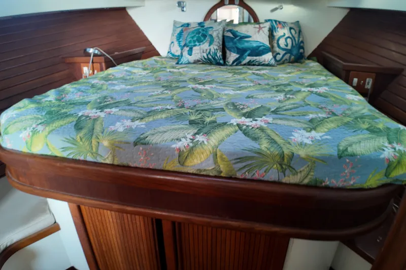 Slide: The Image of Cozy cabin interior of 1999 Anderson Downeast Aluminum Fast Trawler with tropical bedding. - 15