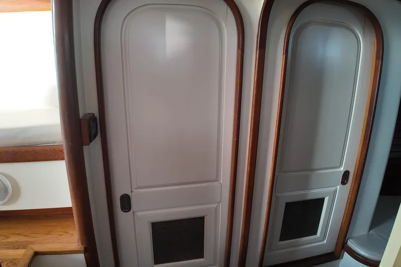 Slide: The Image of Interior of 1999 Anderson Downeast Aluminum Fast Trawler with wooden trim and sliding doors. - 17