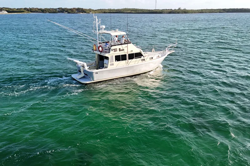 Slide: The Image of Custom 1999 Anderson Downeast Aluminum Fast Trawler cruising on open water. - 3