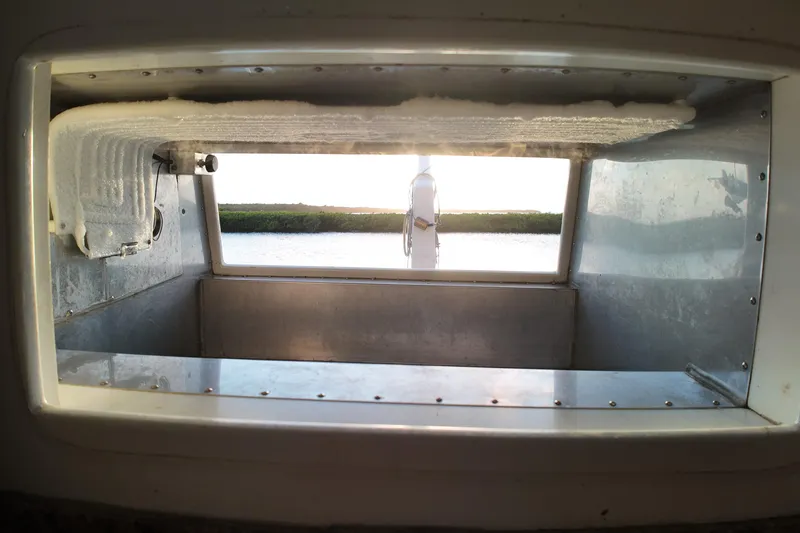 Slide: The Image of Interior view of 1999 Anderson Downeast Aluminum Fast Trawler with frosted compartment. - 35