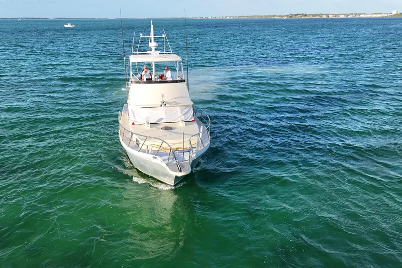 Slide: The Image of 1999 Custom Anderson Downeast Aluminum Fast Trawler cruising on open water. - 4
