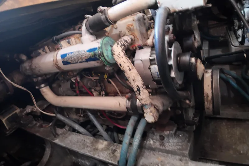 Slide: The Image of Engine of a 1999 Custom Anderson Downeast Aluminum Fast Trawler, showing mechanical components. - 49