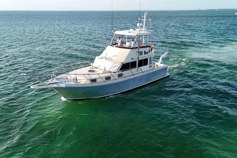Slide: The Image of Custom 1999 Anderson Downeast Aluminum Fast Trawler cruising on open sea. - 5