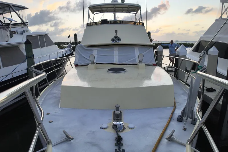 Slide: The Image of 1999 Custom Anderson Downeast Aluminum Fast Trawler docked at marina during sunset. - 52
