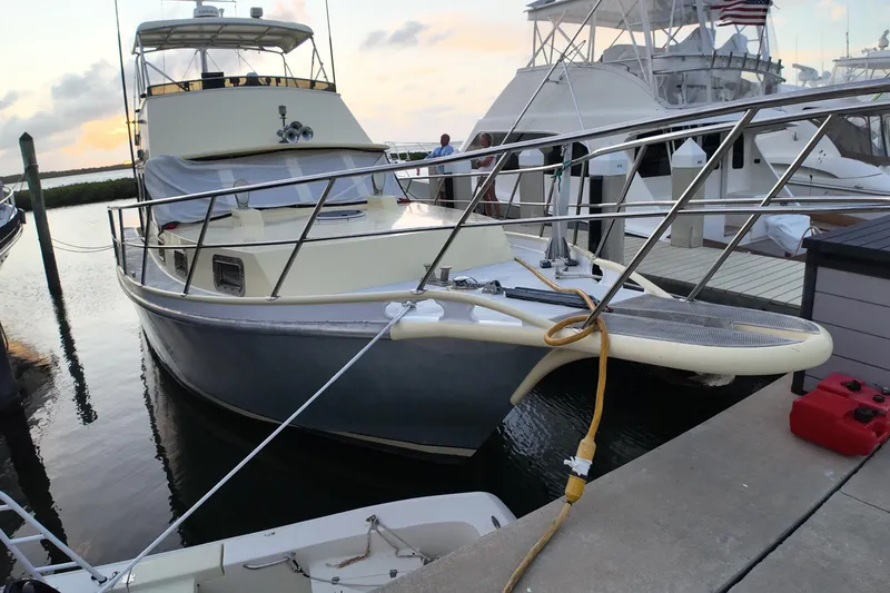 Slide: The Image of Custom 1999 Anderson Downeast Aluminum Fast Trawler docked at marina during sunset. - 53