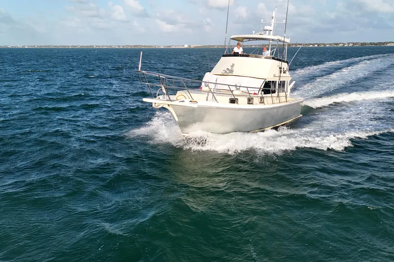 Slide: The Image of Custom 1999 Anderson Downeast Aluminum Fast Trawler cruising on open water. - 6