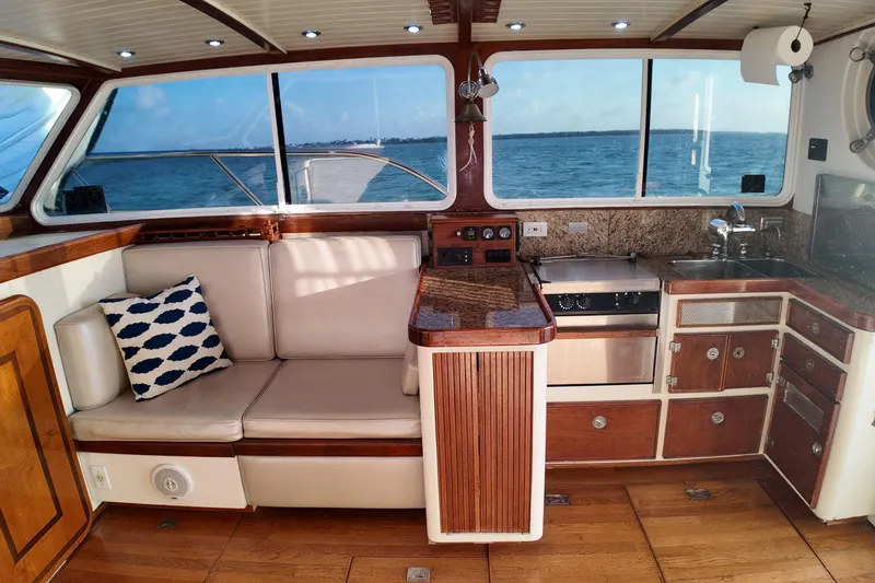Slide: The Image of Interior of 1999 Anderson Downeast Aluminum Fast Trawler with wood accents and ocean view. - 9